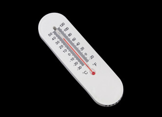 White thermometer isolated on black background