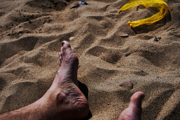 feet on the beach