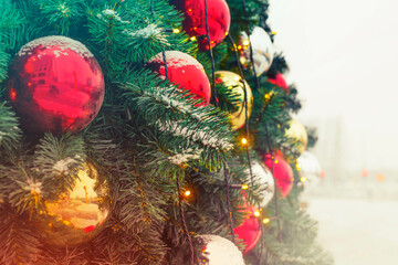 Fototapeta na wymiar winter holidays landscape with decorated christmas tree