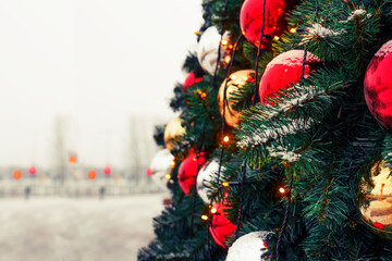 winter holidays landscape with decorated christmas tree