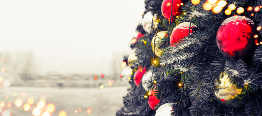 winter holidays landscape with decorated christmas tree
