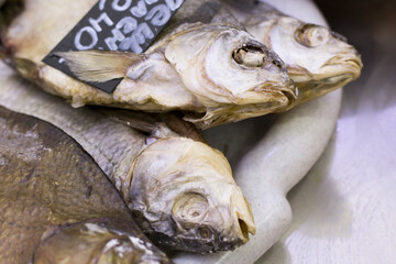 Dried bream in the shop window, fish business
