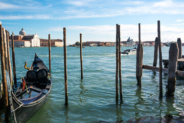 Fototapeta na wymiar View of the Grand Canal and a solitaire gondola at Venice, Veneto, Italy