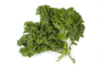 Kale leaves on white background isolated with clipping path. falt lay.