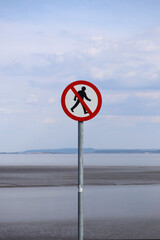 Road sign Pedestrian traffic is prohibited. No entry, no humans allowed sign. Man silhouette in crossed out red circle.