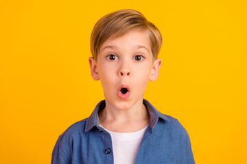 Portrait of astonished person open mouth stupor confused cant believe isolated on yellow color...