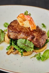 Pork, lamb or beef meatloaf with mushrooms, nuts, tomatoes and herbs. A dish from the chef for serving in a restaurant.