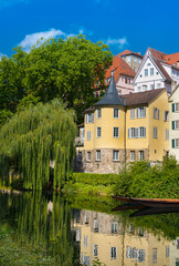 Naklejka na ściany i meble The Hölderlin Tower on the historic old town bank of the Neckar River in Tübingen