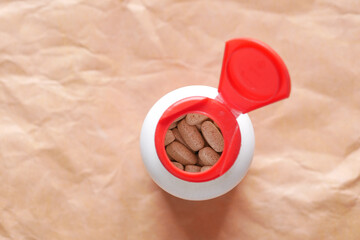 top view of medical pills in a container 