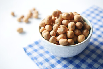 indonesia peanuts in a bowl on table top down .