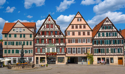 Naklejka premium Historical houses on marketplace in Tübingen old town. Baden Wuerttemberg, Germany, Europe.