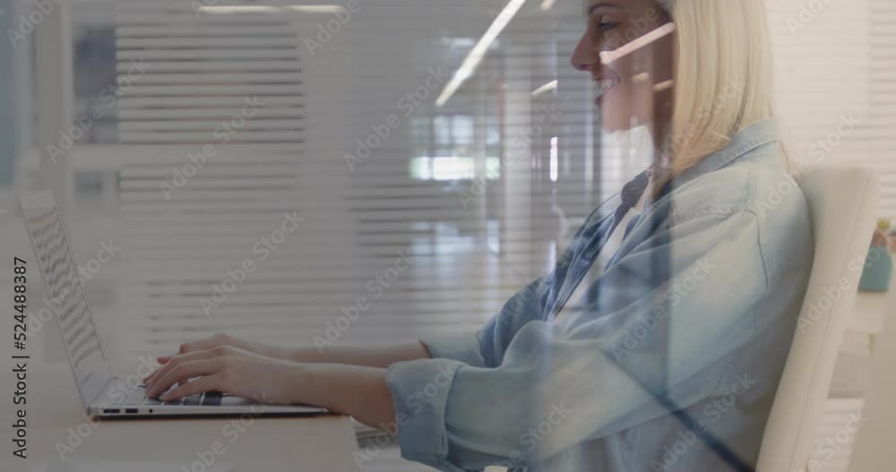 Sticker Animation of people walking over happy caucasian woman using laptop in office