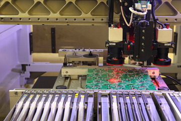 Installer of SMD parts on boards and soldering parts. Machine for automatic assembly and soldering...