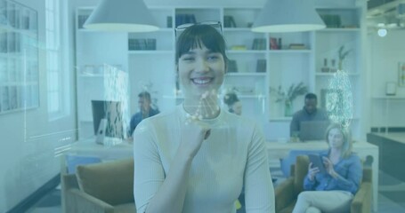 Animation of infographic interface and dnx helix over smiling businesswoman with diverse coworkers - Powered by Adobe