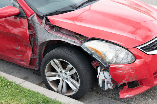 Seattle, Washington, USA - April 1, 2021: broken nissan car after road accident