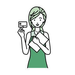 立って書類とカードを手に持つドレスの女性