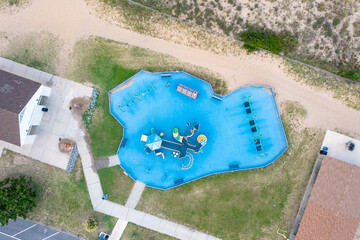 Aerial View Top Down of a Public Park at the Beach Near a Bath House