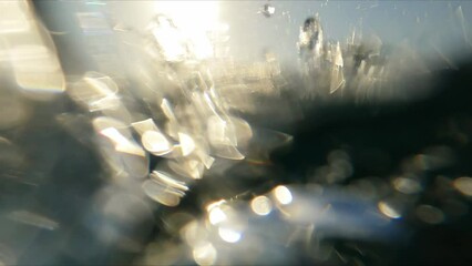 professional swimmer moving through the open water of sea close up slow motion shot