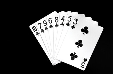 Royal playing cards on a black background.