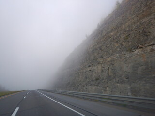 Road travel on American highway with cars and trucks 