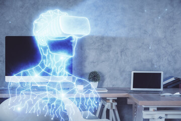 Double exposure of man in VR glasses drawing and office interior background. Concept of AR.
