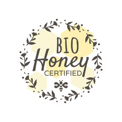 Bio certified honey label. Colorful badge with floral wreath and honey comb.