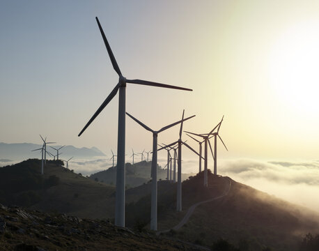 Wind turbines and wind farm at sunset in Navarra, Spain