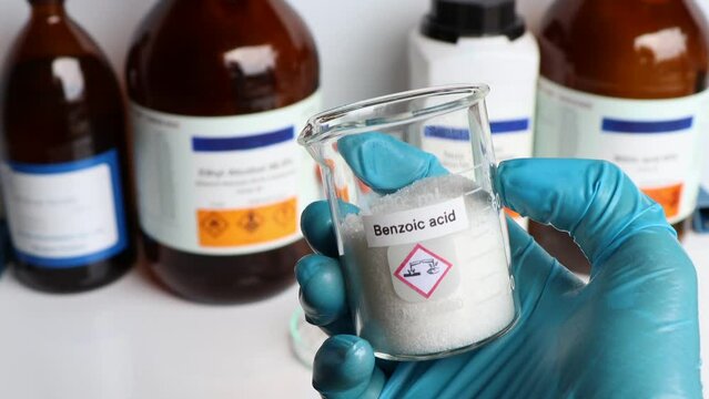 benzoic acid in glass, chemical in the laboratory and industry
