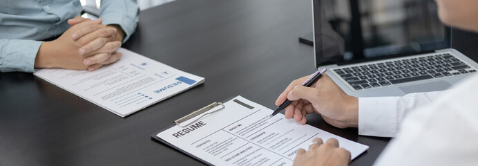 Employer or HR department is reading the resume and interviewing the ability of new employees, job...