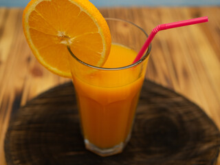 Fresh juice, mix fruits, orange drink on a blue background