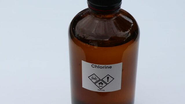 chlorine in bottle, chemical in the laboratory and industry