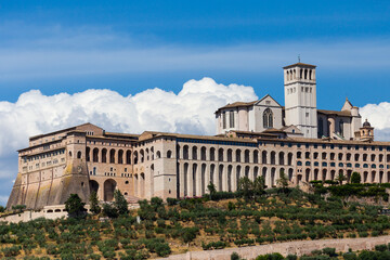 Fototapeta premium Assisi village in Umbria region, Italy. The most important Italian Basilica dedicated to St. Francis - San Francesco.