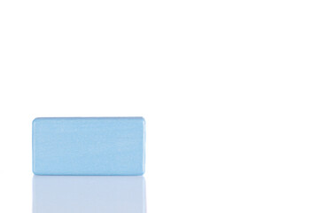 Wooden cube of blue color on a white background