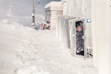 Turnstile in the snow at a ski resort. Turnstile to the ski lift on a winter snowy day