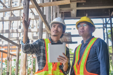 Team engineer Two man architect on a building construction site