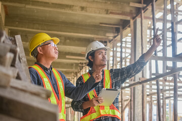 Team engineer Two man architect on a building construction site