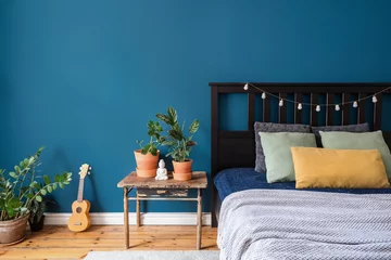 Fotobehang Boho cozy bedroom in apartment with bohemian interior  © brizmaker