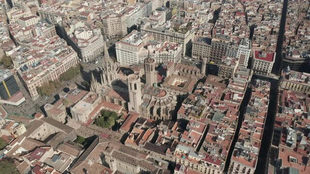 High angle view of historic Cathedral of Barcelona. Large religious building in city centre. Barcelona, Spain