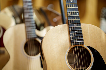 Photo of acoustic guitars in a store