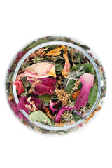 Dry herbal tea with flower petals on a white background. Isolate