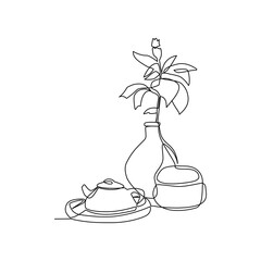 bouquet of flowers and tea pot