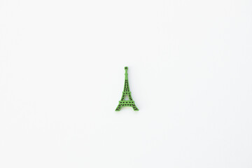 Colored wooden Eiffel Tower on white background