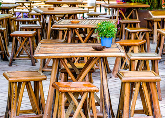 table and chairs at a sidewalk cafe