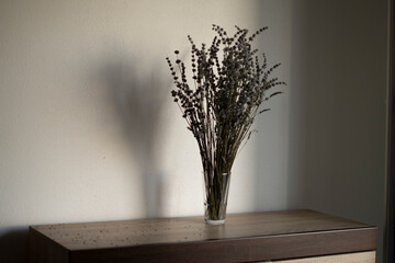 A bouquet of lavender on a wooden stand