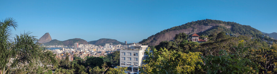 city wall top view tram centrocity vegetation arches trees grass bromeliad ruin hill sky christ the redeemer sea bay ship boat helicopter house building horizon landscape sky line bridge roof