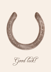 An aquarelle pencil artistic hand drawn image of a brown horseshoe with a writing "Good luck!" on a light brown background as an element for design of texts, labels, greeting and invitation cards