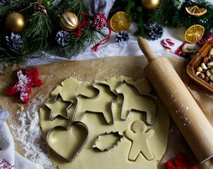 Christmas cookies of different shapes on a dish in a festive decor