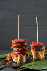 Black pudding pintxos with tomato