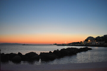 Tinos island,Sunset on the island Tinos ,Tinos is a Greek island situated in the Aegean Sea, located in the Cyclades archipelago, Greece.