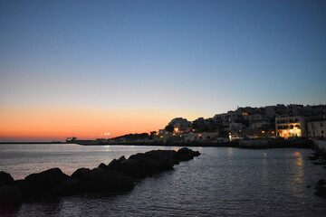 Tinos island,Sunset on the island Tinos ,Tinos is a Greek island situated in the Aegean Sea, located in the Cyclades archipelago, Greece.